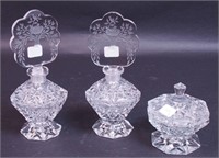 Two large cut glass perfume bottles,