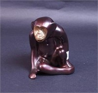 A 6" bronze seated monkey by Loet