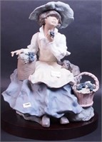 A Lladro figurine titled "Fruitful Harvest",