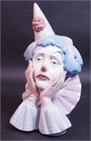 A 12" high Lladro clown bust with head in