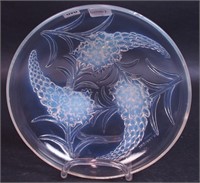 An 8 1/2" glass bowl with opalescent