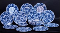 11 matching flow blue Blue Onion-style plates
