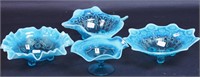 Four pieces of blue opalescent glass: