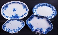 Four non-matching flow blue platters