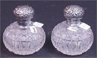 A pair of cut glass dresser bottles