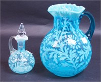 A blue opalescent water pitcher