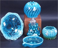 Five pieces of blue opalescent glass: