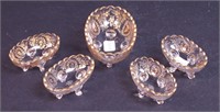 A gold and ruby enameled glass nut set