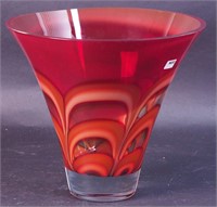 A 9" red and orange art glass vase,