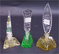 Three cut  glass perfume bottles: