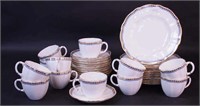 A 24-piece dessert set by Royal Crown Derby,