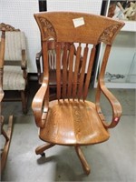 Hand Carved Oak Rolling Office Chair