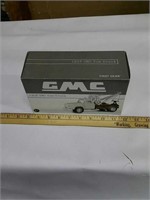 Gmc 1958 tow truck 

Die cast NIB