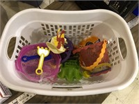 HAMPER FULL OF SAND TOYS