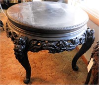 Chinese black lacquered and highly carved round
