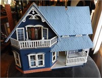 Hand crafted doll house, furnished with furniture
