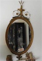 Antique gold framed oval mirror 34”