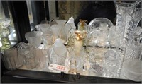 Entire shelf of clear glass: decorated vase,