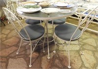 Vintage metal and glass top patio table and