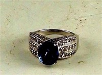 Marked .925 ladies ring with Sapphire stone