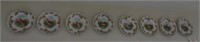 Set of (8) hand painted German game plates with