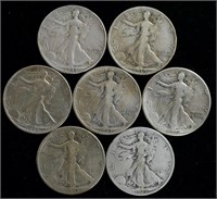 Coins - 7 Walking Liberty Half Dollars -