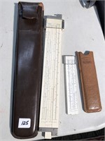 Two slide rules in their cases