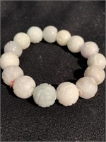 Carved jade bead bracelet, the beads are about