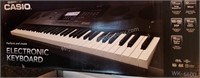 Casio WK-6600 Electronic Keyboard with Stand