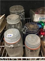 jars with steel lids and decorated sides