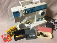 Singer 9410 sewing machine and accessories