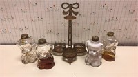 Perfume display and puppy bottles