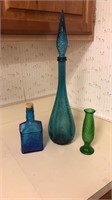Tall decorative glass bottle