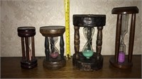 4 dark wood frame hourglasses