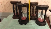 4 dark wood hourglasses