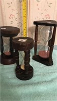 3 dark wood hourglasses