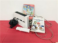 Wii player, w/ paddles & cords