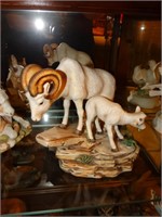 Porcelain ram & young figurine