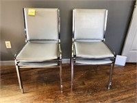 Four metal and gray chairs