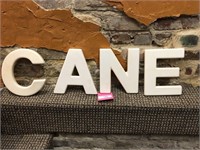 Off White plastic letters "CANE"