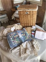 Basket of doilies and linens