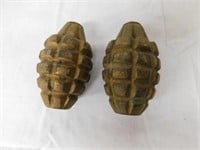 Pair of metal grenades