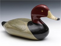 A CANVASBACK DRAKE CARVED AND PAINTED WOOD DECOY