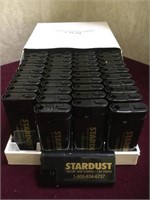 New old stock case of unused Stardust lighters