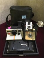 Lot of cameras incl. Polaroid and more