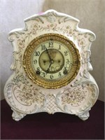 Antique Ansonia porcelain clock with pendulum