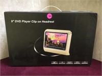 New black 9" DVD player with headrest clip on for