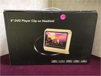 New 9" black DVD player with headrest clip for