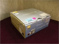 Nikon Coolpix S10 digital camera in box