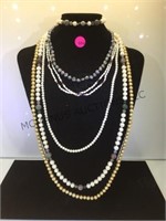 Lot of pearl necklaces some with sterling clasps